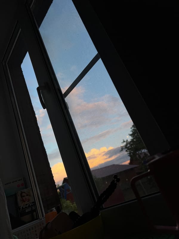 Sunset sky views through windows in Afanasyevo, Russia