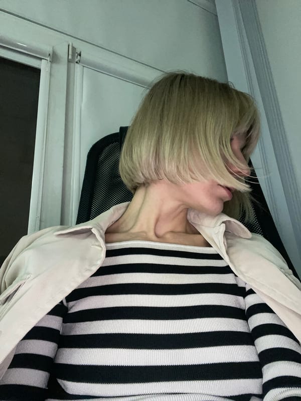 Person relaxes indoors in Moscow apartment setting