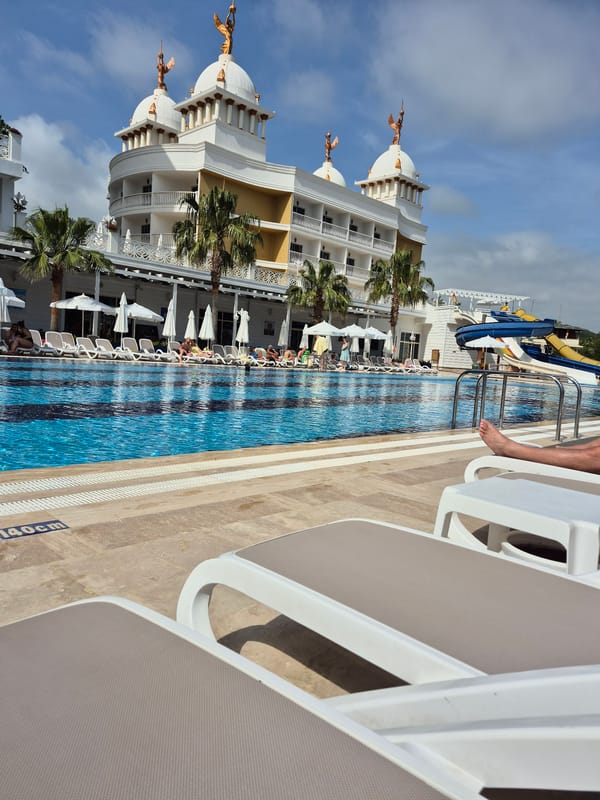 Resort pool and hotel exterior observed in Alanya, Turkey