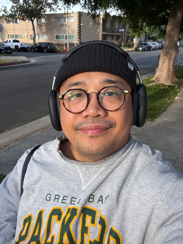 Person in Packers gear photographed on LA sidewalk