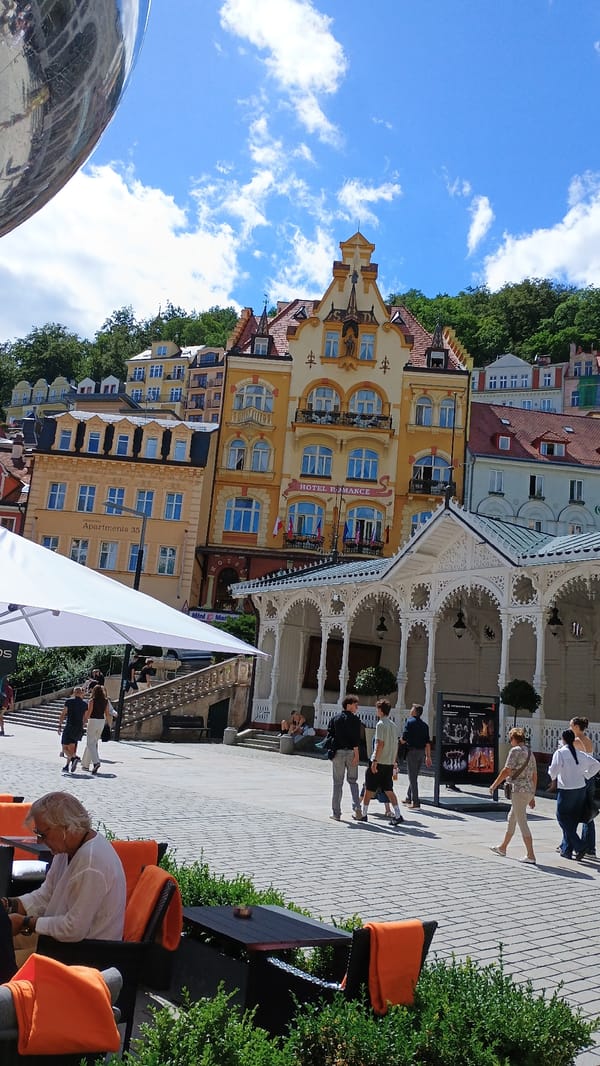 Sunny afternoon in Karlovy Vary's colonnades and pedestrian streets