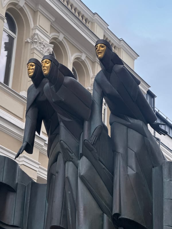 Bronze sculpture with golden faces spotted at Vilnius theatre