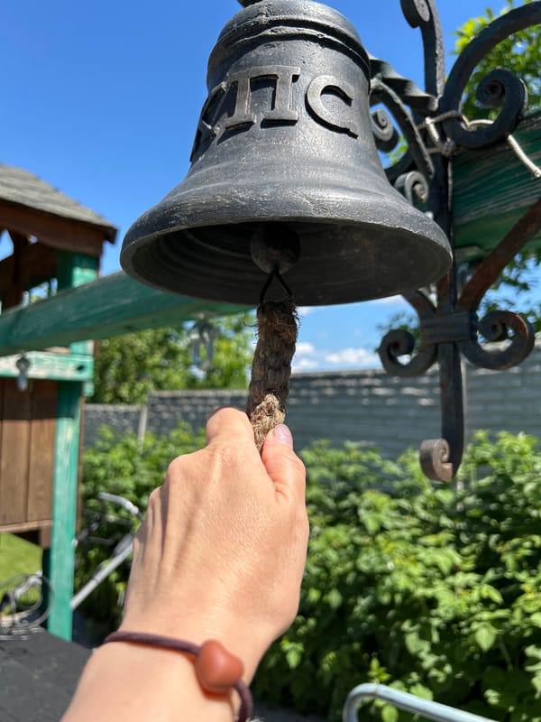 Bell, bloom, and lakeside calm in Hnarovske