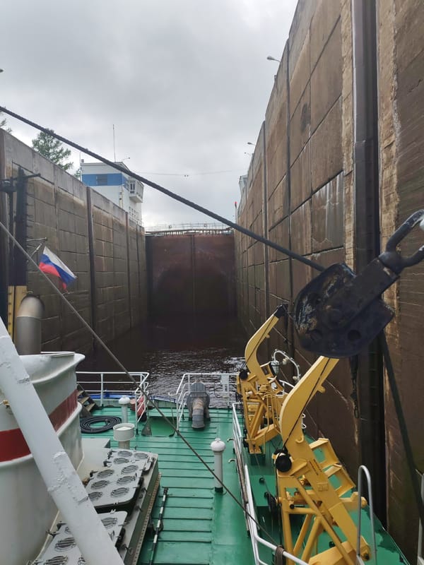 Barge transits Volga-Baltic Waterway lock in Devyatiny, Russia