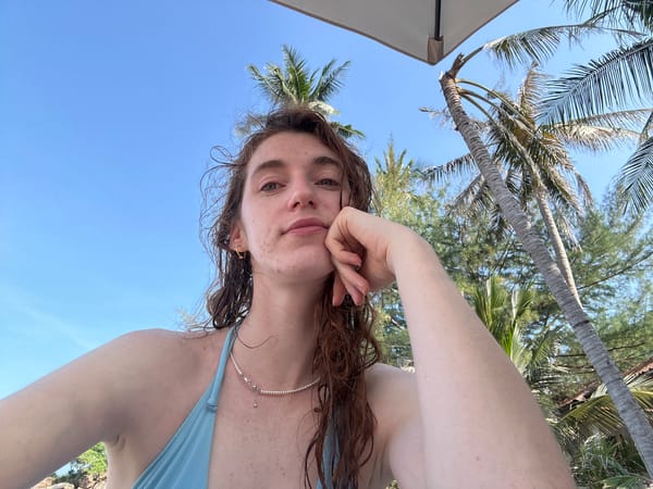 Woman enjoys morning beach time in Thailand