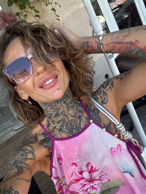 Tattooed and dressed in pink, selfie time in Nha Trang