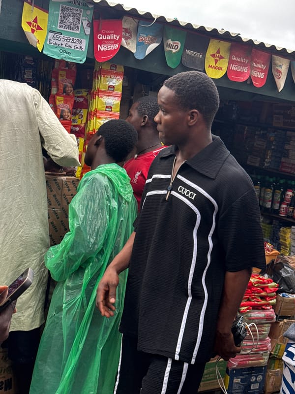 Nigerian street markets busy with vendors and shoppers