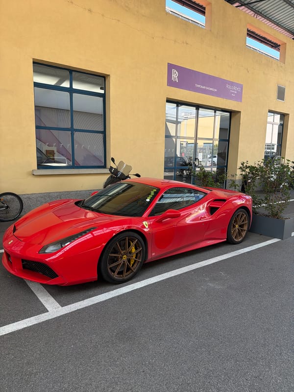 Luxury car collection at Milan automotive showroom and workshop