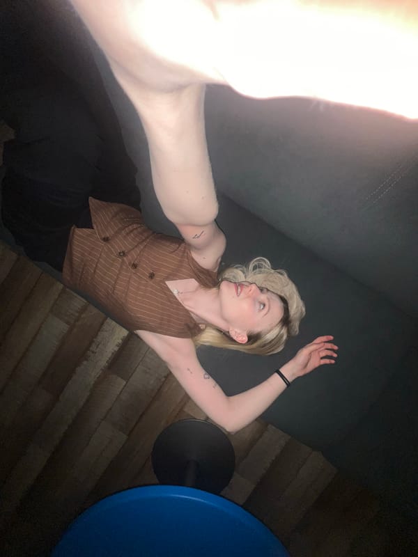 Woman takes multiple selfies in Khimki indoor locations