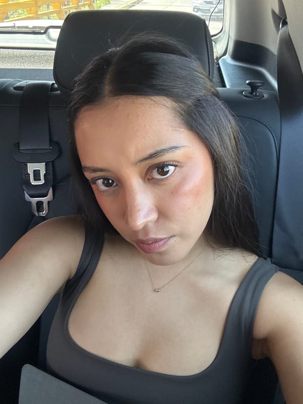 Woman takes car selfies in San Bernardino Tlaxcalancingo