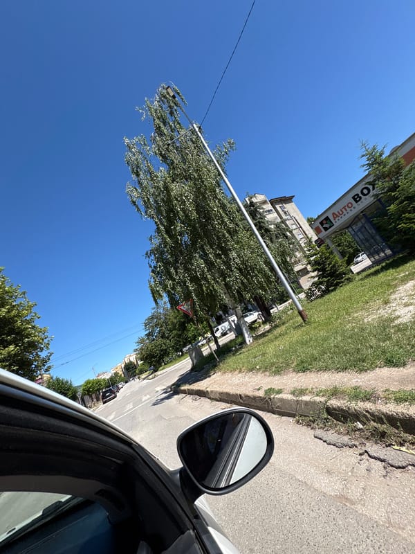 Car ride through Vratsa streets on sunny afternoon