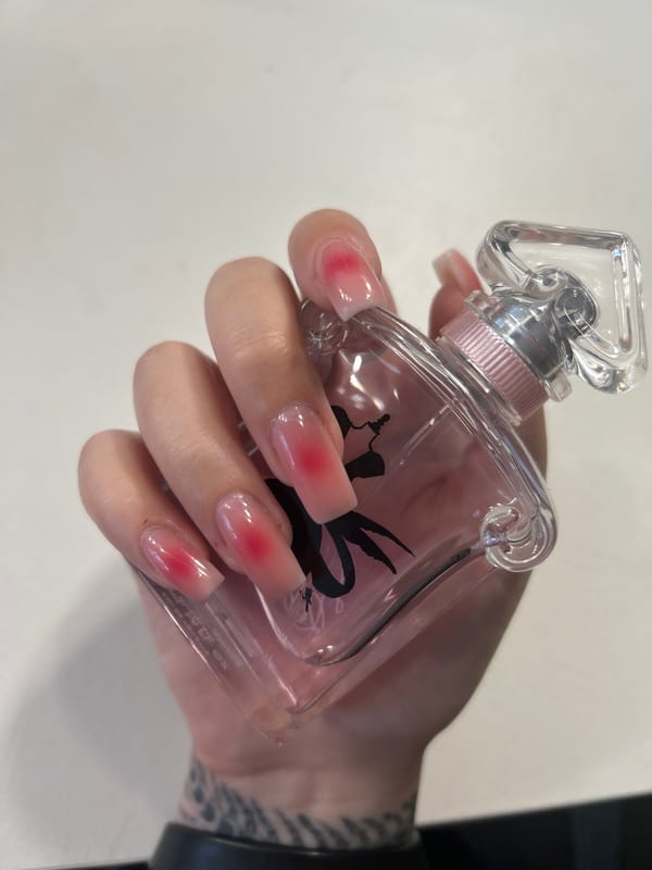 Person displays perfume collection in Ufa, Russia