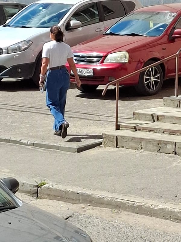 Street scenes, storefronts, and garden close-ups in a Russian city