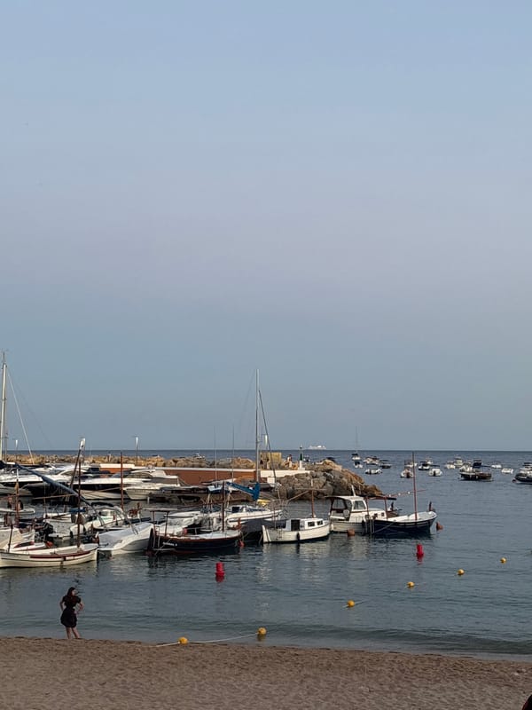 Dusk settling over two Costa Brava beach towns