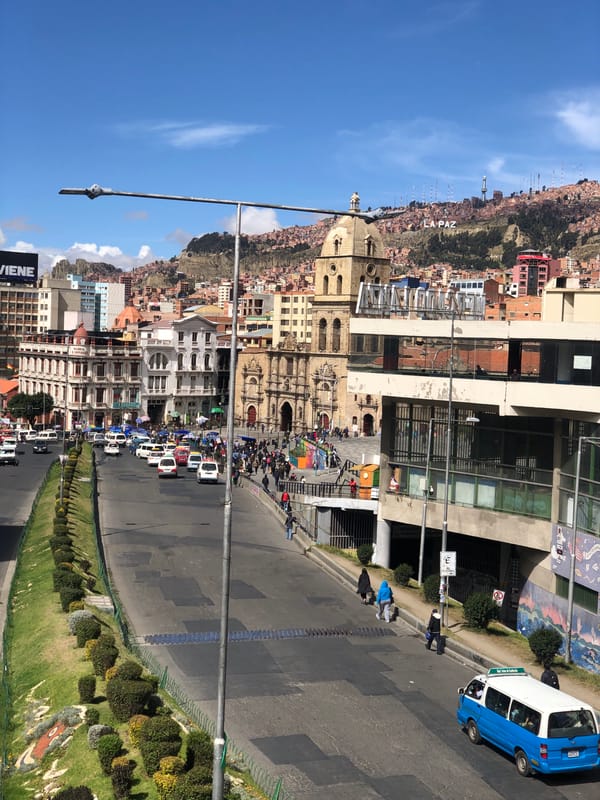 Clear skies over bustling La Paz street scene