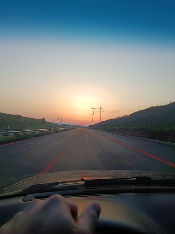 Empty highway captured at sunrise near Krustina, Bulgaria
