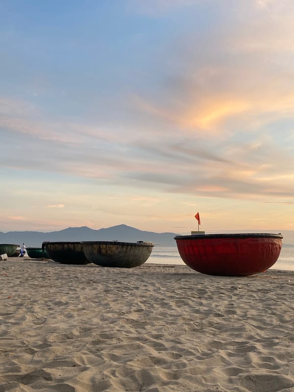 Sunset and basket boats on the Đà Nẵng shore