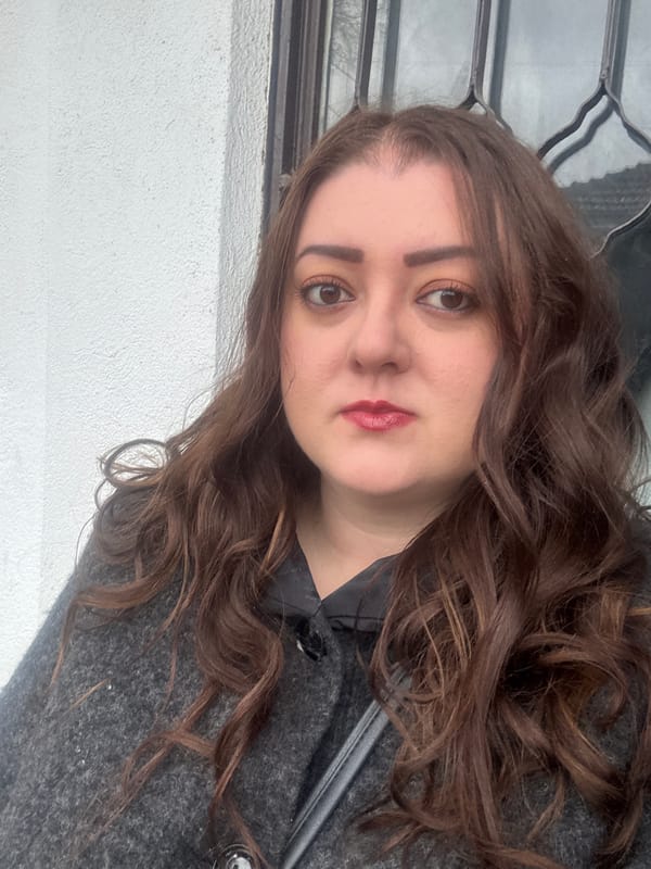 Woman takes selfie outside building in Varna