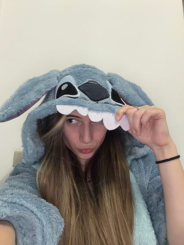 Woman photographed in costume onesie, robe in Plovdiv apartment