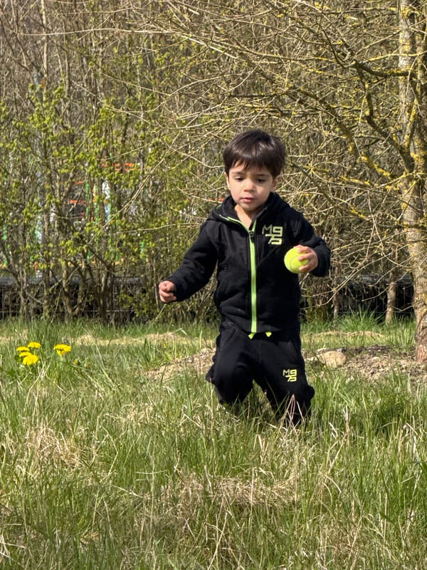 Child explores colorful pump track in Junglinster, Luxembourg