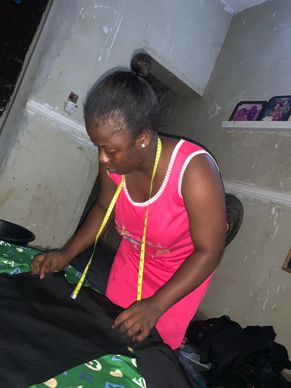 Fabric work and downtime in an Akwanga home