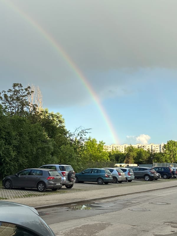 Rainbow spotted over Sofia street amid cloudy skies