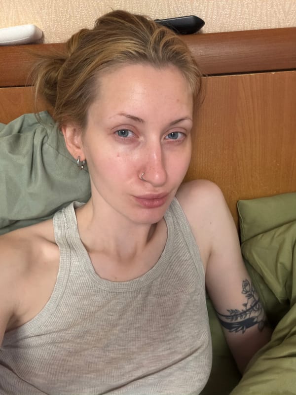 Relaxing on a bed indoors near Ladoga Lake, Russia