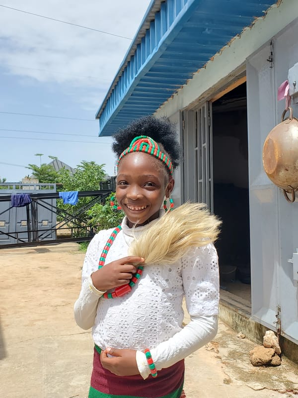 Everyday moments in Gura Top, Nigeria — people, style, and craft