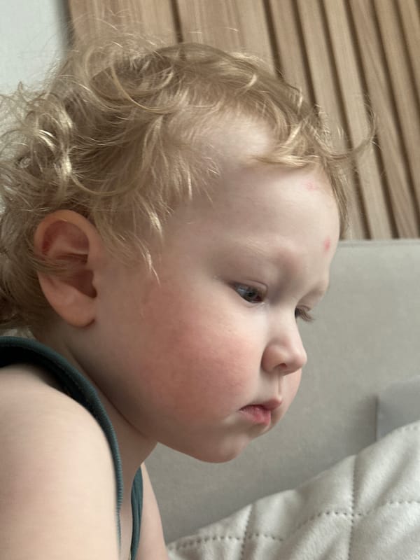 Child explores closet contents in Votkinsk home