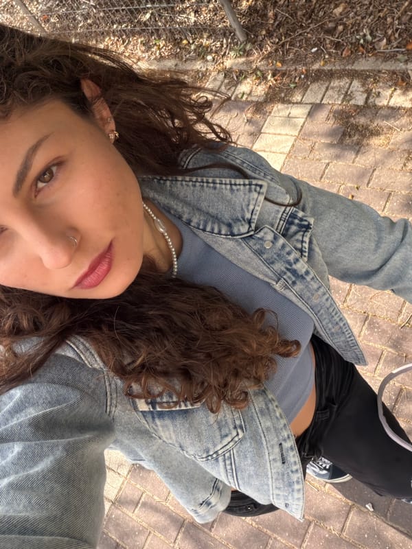 Woman takes morning selfies in Kiryat Bialik, Israel
