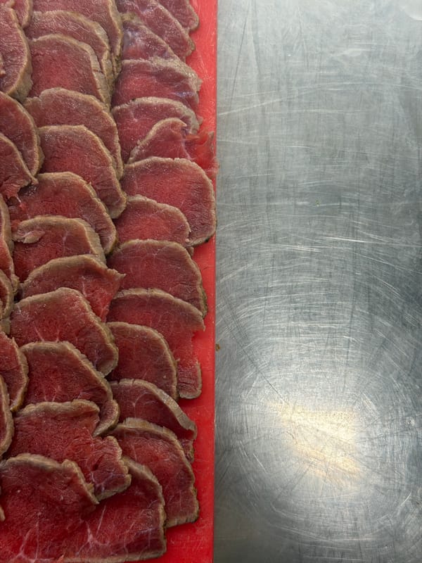 Professional kitchen operations documented during lunch prep in Belgrade