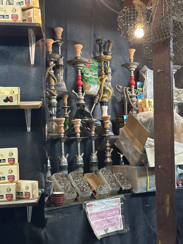 Gaza City shops display hookahs, bread in afternoon commerce