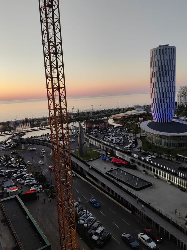 Batumi skyline glows at sunset along the Black Sea