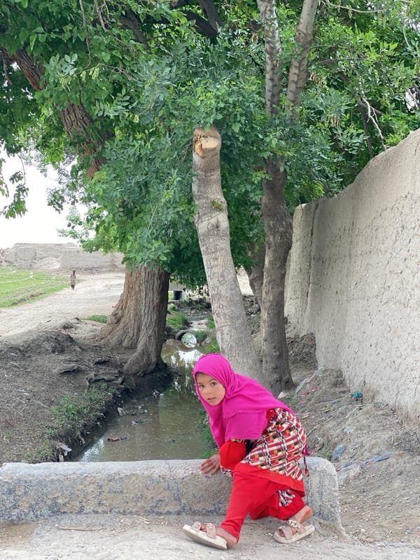 Rural Kandahar residents captured in everyday moments during morning hours