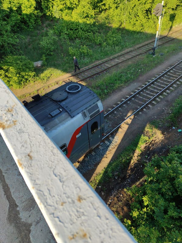 Railway scene documented from bridge vantage point