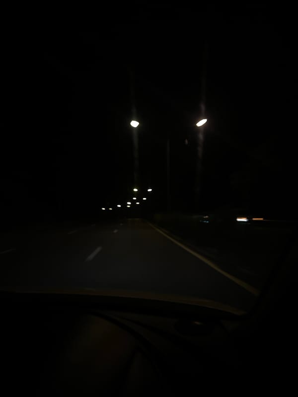 Nighttime driving documented on highway in Wichit, Thailand