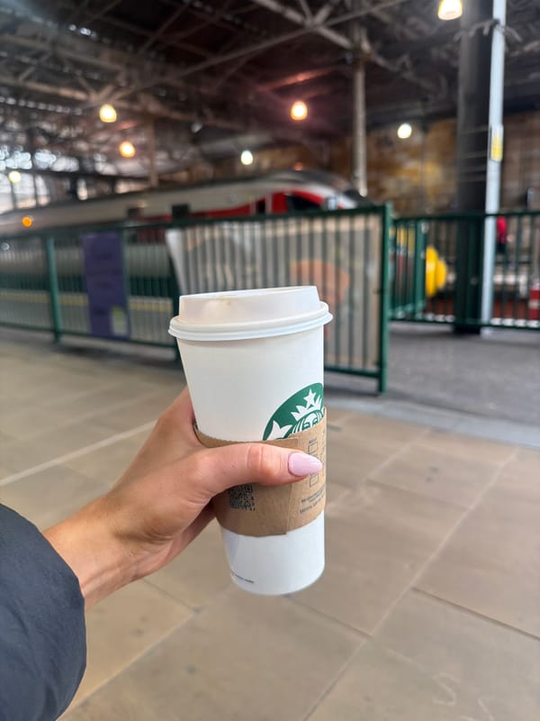Starbucks coffee cup at an Edinburgh train station
