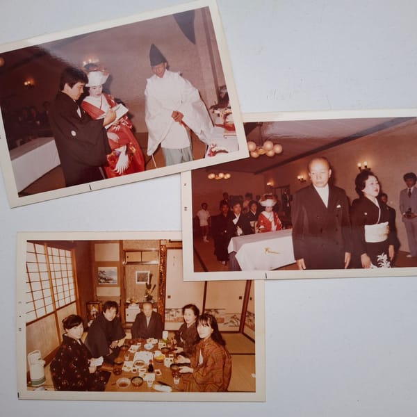 Japanese wedding photos arranged on surface