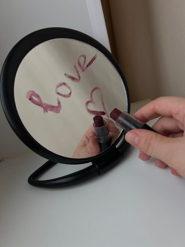Person writes love message in lipstick on mirror in Ufa