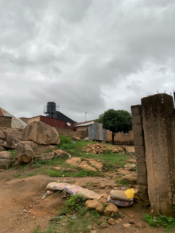 Morning life documented across Jos, Nigeria under overcast skies