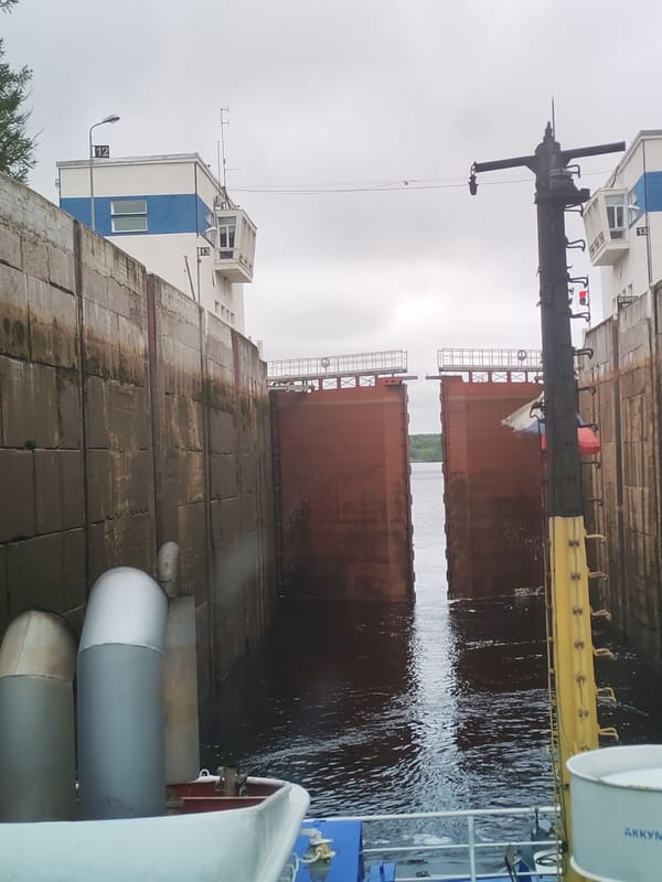 Boat passes through lock system in Markovo, Russia