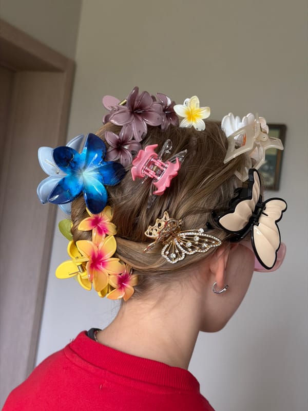 Young person showcases elaborate hair clip collection in Latvia