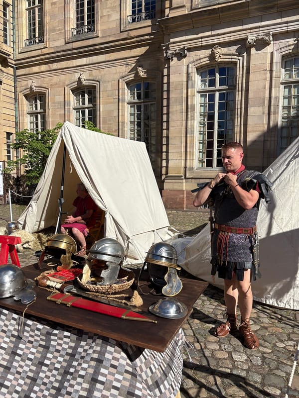 Summer afternoon scenes around Strasbourg's historic squares and fountains
