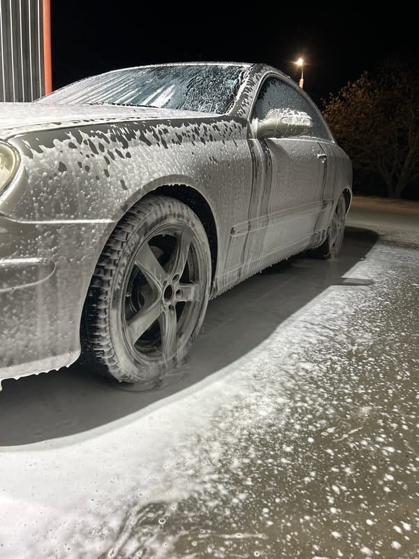 Silver Mercedes gets soapy car wash in Strelcha, Bulgaria