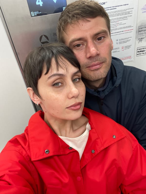 Couple takes selfie in elevator in Izhevsk, Russia