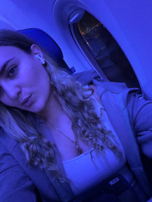 Passengers settle in during nighttime flight from Miami