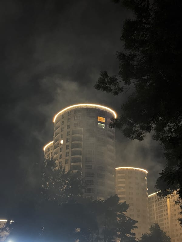 Smoke and city lights on a summer night in Burgas