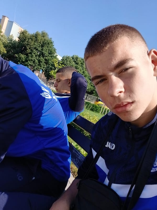 Young men take morning selfies in Burgas, Bulgaria