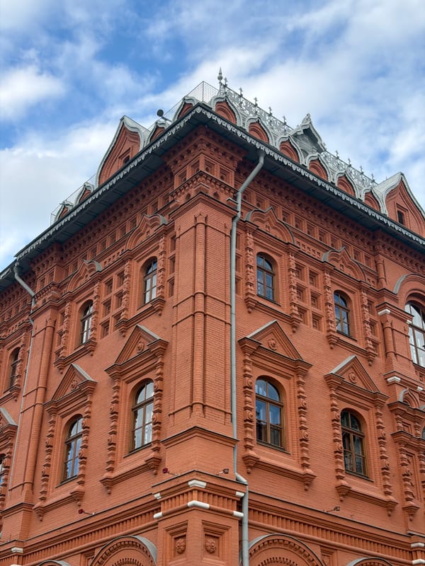 Tourist documents walking tour through central Moscow landmarks and shops