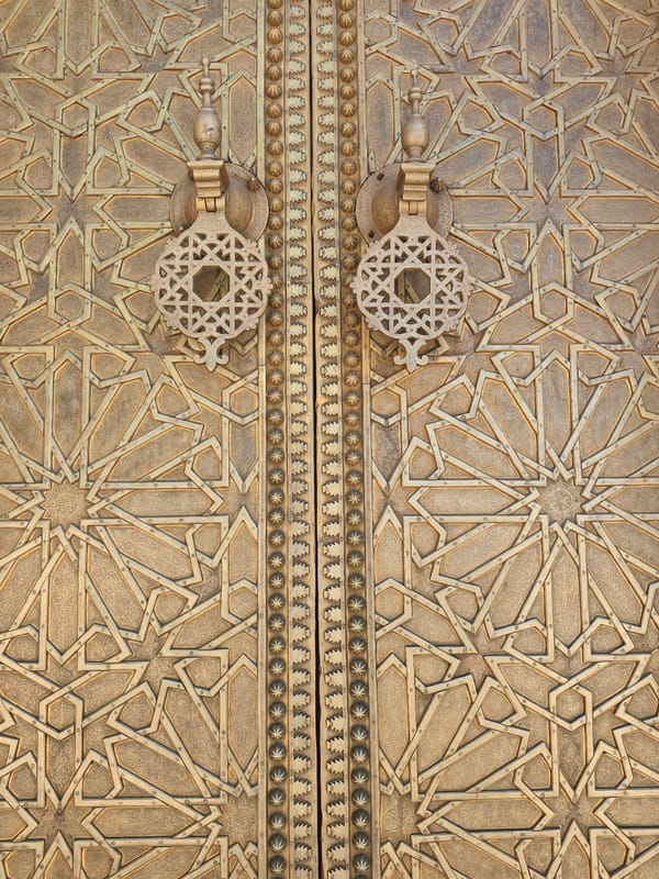 Ornate Islamic geometric doors captured at Mechouar Fes Jdid